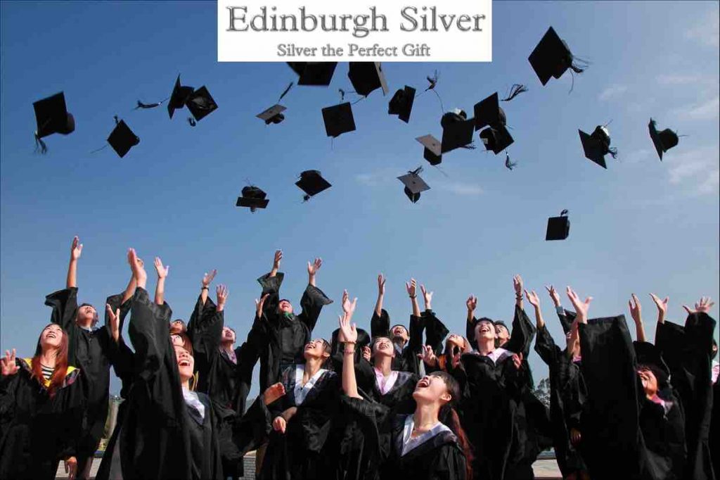Graduation day photo mitre boards in the air with perfect graduation gifts from Edinburgh Silver frame it 